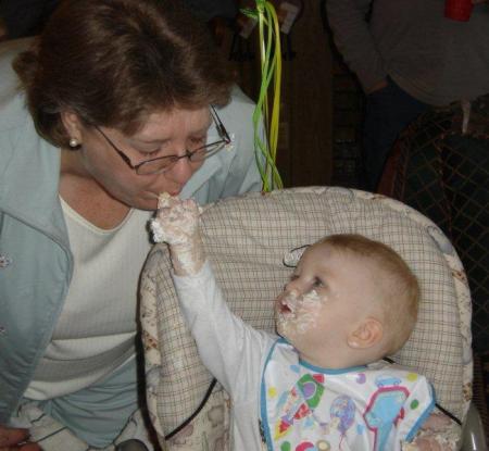 Connor feeding Gramma on 1st BD .