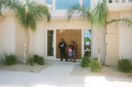 My kids at front door of our Dreamhome