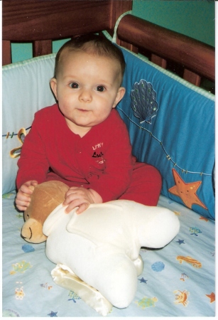 Lucas with toy, 5 months old