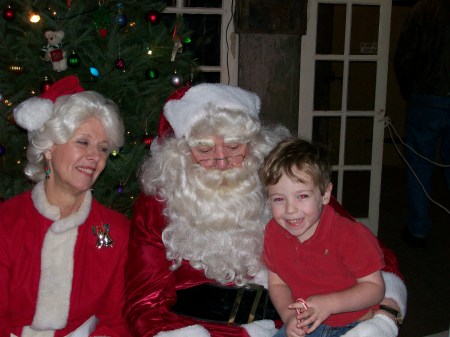 Logan with Santa and the Mrs.