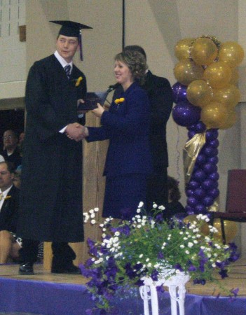 Anthony getting his diploma~