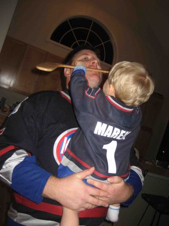 Daddy takes Hockey stick to the face
