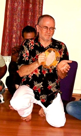 Playing tambourine for a celebration