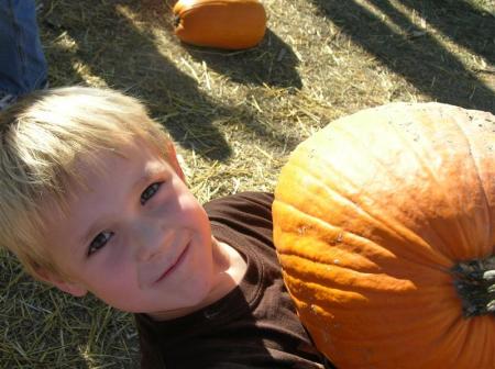 My little Pumpkin with his pumpkin