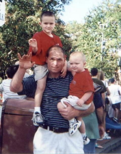 Dad and sons at disney