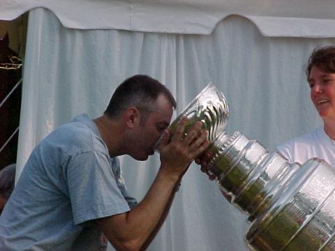 Mike drinking from cup 7/02/2002