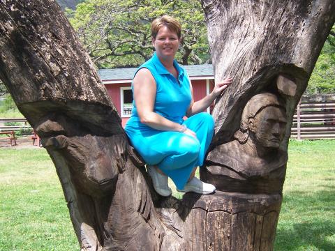 PENNY IN CARVED TREE