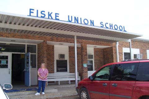 Pamela in front of Fisk Union School