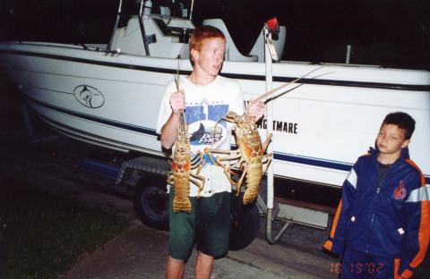 Stepson with Lobster after Dive Trip