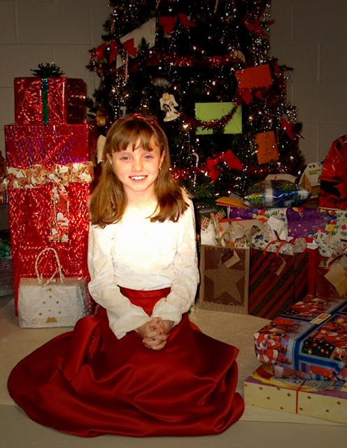 Daughter Azia posing by tree 12/03