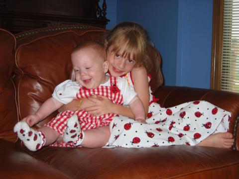 Sadie & Hailey on couch 2