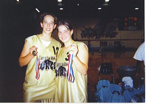 Lucy & her team-mate Misty after AAU Tournament Championship Victory
