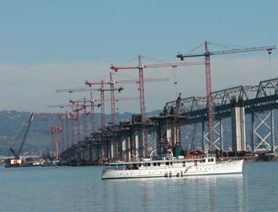 picture cranes with old boat