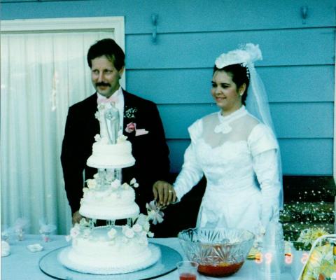 Nedy & jerry's wedding cutting the cake