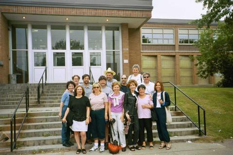 Bus Tour Group in front of NHS