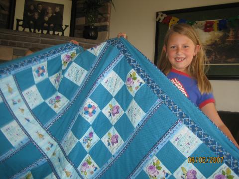 I love quilting for 11 grand kids