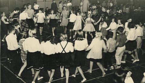 May Day Cotten Eyed Joe Dance in the Campus School Gym