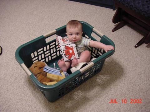 Tommy in a basket