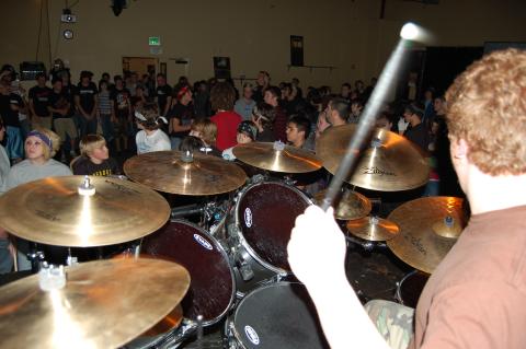 My son playing drums at the Underground