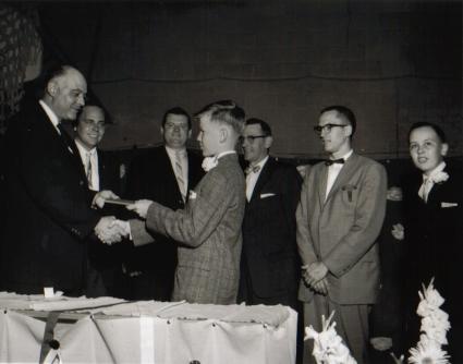 Ken Walter receiving diploma