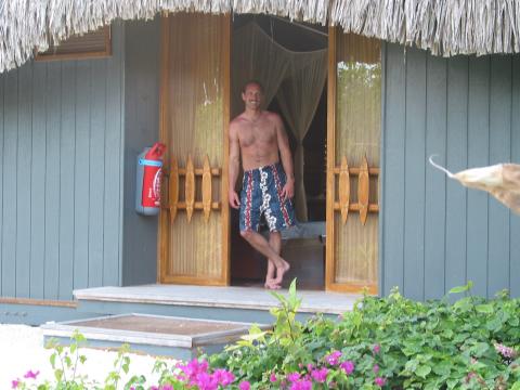 Ken in door of beach bungalow