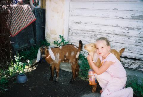 Briana w/ our baby goats