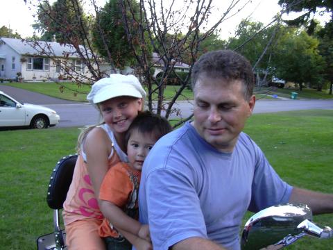 Kids on Papa's bike
