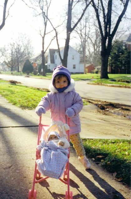 Grace walking her baby Dec 2001