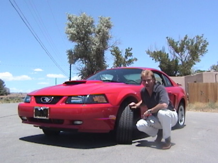 Me and my new 2003 Mustang GT on my 50th.