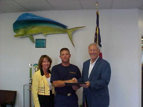 Giving awards to USCG
