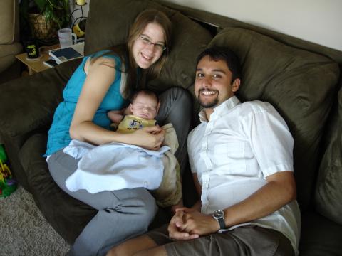 Elizabeth and Vikram, with nephew Ryder