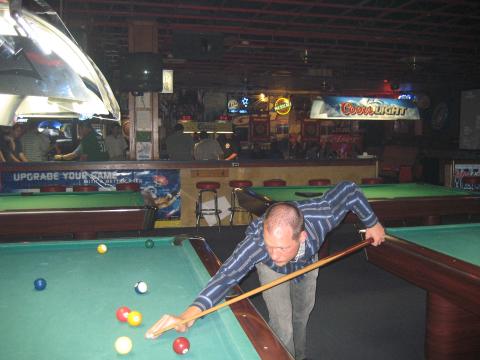 Kevin shooting pool