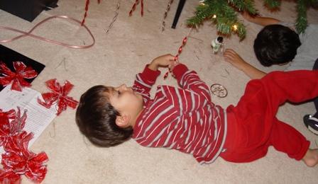 Noah decorates tree  from the bottom Nov 05