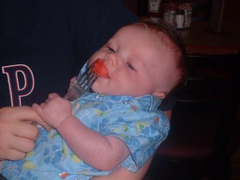 Kaleb loving watermelon @ the restaurant