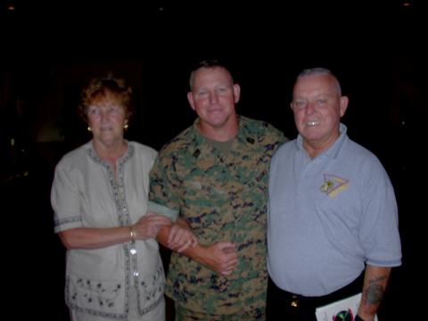 Mom and Dad with me at my retirement