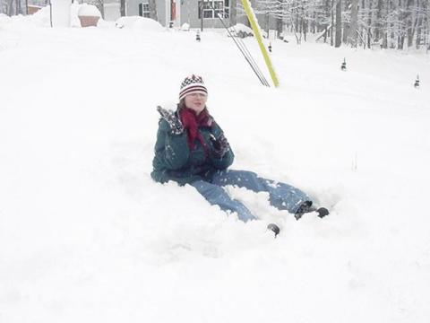 Katie sitting in snow