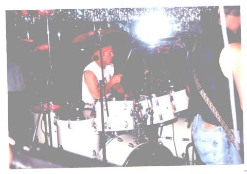 Don playing drums
