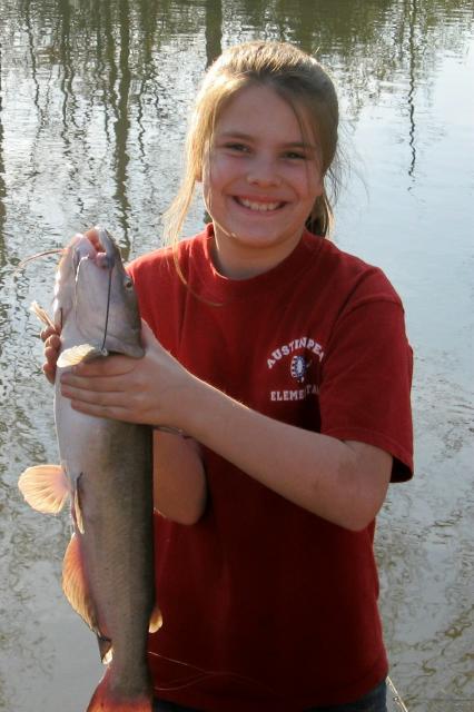 Brandi likes to fish like her daddy!
