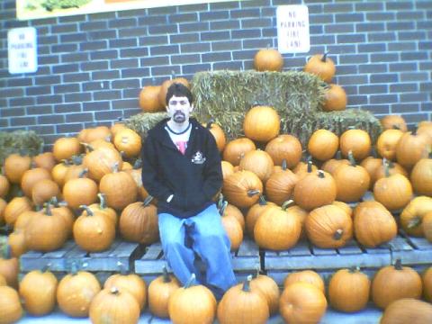 Rodney sitting on pumpkin 2