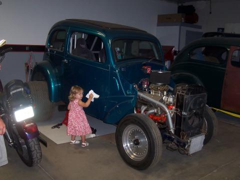 Kayla with pop's car