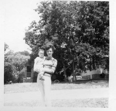 Me holding Anthony Monreal, son of Jesus & Sylvia (Massengill) Monreal, 1964