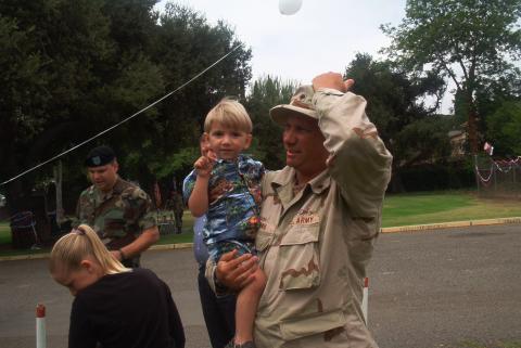 jarrett and his daddy at army