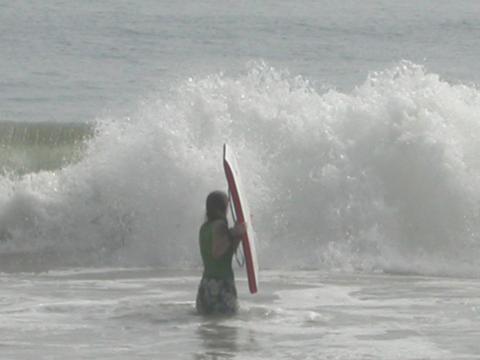 Jennica catches some waves