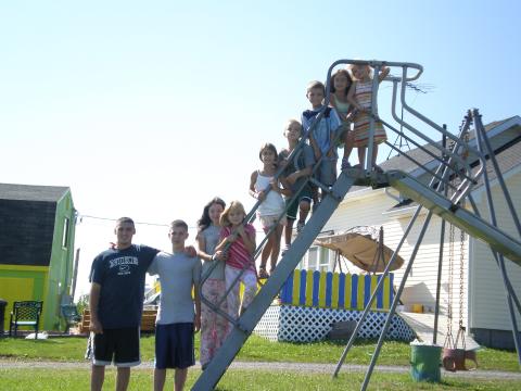 family in front ofslide