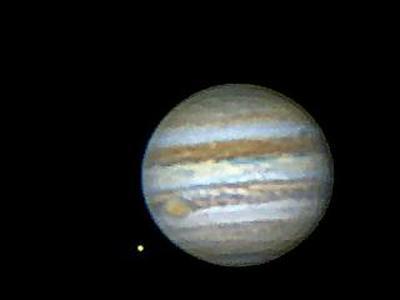 Jupiter and 1 of its moons