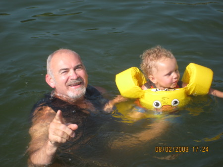 My youngest son Leland swimming with his papa