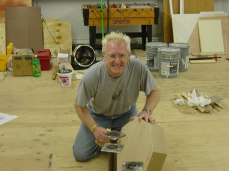 Bryan working on the church furniture