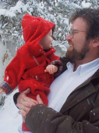 Frank shows our son the snow