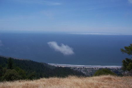 above the clouds looking down on the Pacific