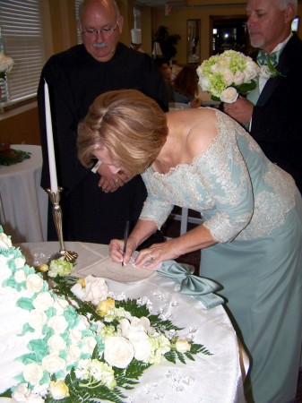 signing marriage certificate